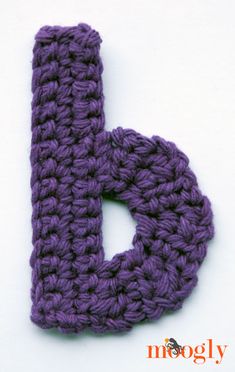 the letter b is made up of crocheted yarn