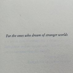 a piece of paper with the words for the ones who dream of strange worldss written on it