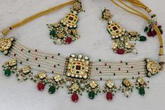 https://ismycreations.etsy.com Free Shipping Please contact for any query Raw material - artificial jewelry, kundan beads, Necklace  Length  = 24 CM Earring = Length =  9  CM 100% Satisfaction Guarantee: 1 Year Warranty, Long Lasting Plating, High-Quality Stones. Occasion: Perfect choice for any Indian occasion. Care: It is advisable that you keep Ismycreations products away from direct heat, humidity, and moisture.  Return/Exchange Policy: We provide 14 days return/exchange policy. Contact us f White Kundan Jewelry For Jewelry Making, Handmade White Temple Jewelry Bridal Necklace, Handmade White Bridal Temple Jewelry Necklace, White Traditional Kundan Necklace For Jewelry Making, Handmade Multicolor Bridal Earrings For Wedding, Handmade Multicolor Bridal Necklace For Wedding, Handmade Kundan Necklace For Wedding And Festivals, Handmade White Kundan Necklace With Round Beads, Multicolor Jewelry For Marriage And Festivals