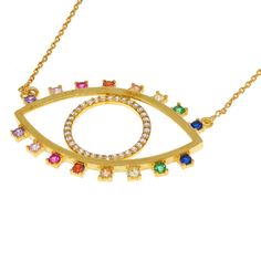 You bring a rainbow of lively energy into every room you enter—let your look put that rare gift of yours front and center! This stylish, modern evil eye necklace was made to celebrate your creative vision and warm, adventurous soul, reflected in its colorful array of crystal gems. It's a stunner when worn solo, but it elevates every layered look it lands upon. Use its artful aesthetic as the extra boost you need to finally try that wild lipcolor or bold highlighter waiting in your makeup stash. Modern Rainbow Jewelry For Gifts, Modern Rainbow Jewelry For Gift, Modern Rainbow Colored Jewelry For Gifts, Modern Rainbow Jewelry Gift, Multicolor Evil Eye Necklace As Gift, Multicolor Evil Eye Necklace For Gift, Rainbow Evil Eye, Modern Evil Eye, Evil Eye Necklace Silver