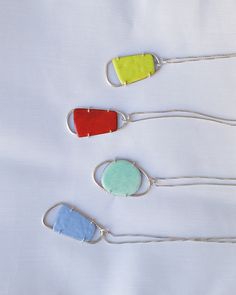 Silver pendants, with a satin finish, handmade, and a copper piece, enamelled over fire, in different colors. Each pendant has a unique and unrepeatable design due to the way they are made. Contemporary in style, they are the perfect detail for lovers of color and/or design. Irregular geometric design, each piece is approximately 3.5 cm long (they are all different) and the width is approximately 1.5 cm, except for the most rounded one, which is about 2cm. Four different models are available, ea Contemporary Pendant Necklace For Gift, Contemporary Red Jewelry For Gift, Contemporary Red Jewelry For Gifts, Contemporary Red Jewelry As A Gift, Modern Orange Necklace As Gift, Modern Orange Necklace For Gift, Modern Handmade Enamel Jewelry, Hand Painted Green Modern Jewelry, Modern Hand Painted Green Jewelry