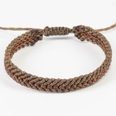 "Brown friendship bracelet perfect Father's Day gift. Ankle bracelet excellent birthday gift for teens. Two colored mocha brown and dark brown macrame bracelet made from waxed thread. The center of the bracelet has a different knotting style and different color. Each thread knotted together to make this extremely interesting pattern. These bracelets are gender-neutral. The width of the bracelet is 8 millimeters.  The bracelet closes with an adjustable design. There are four options: 14.5cm for regular/average wrist size and 17cm for larger wrists.  20cm for regular/average ankle size and 22cm for larger ankles.  Please feel free to message me with any special orders: *Different colors  *Sizes *More than one All of our bracelet designs are extremely durable. They are waterproof because of t Handmade Brown Braided Bracelets For Friendship, Handmade Brown Braided Friendship Bracelets, Adjustable Braided Friendship Bracelet Gift, Brown Macrame Jewelry For Friendship, Brown Waxed Cord Bracelets For Gift, Brown Waxed Cord Bracelet For Gift, Adjustable Casual Jewelry For Birthday Gift, Gift Brown Braided Bracelets With Sliding Knot, Macrame Bracelets With Waxed Cord As A Gift