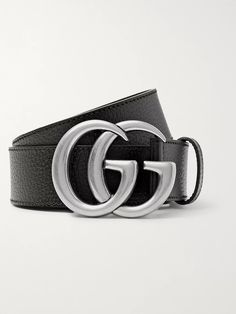 Mr Alessandro Michele's debut menswear collection at Gucci opened with a look which included this double-'G' belt; that it's still around today shows how good an investment it is. The archival emblem is seen here in silver that's slightly burnished and the strap is made from black full-grain leather. Designer Black Belt Buckles With Silver-tone Logo, Designer Black Belt Buckle With Silver-tone Logo, Gucci Designer Belt Buckles For Business, Designer Leather Belt Buckles With Palladium Hardware, Designer Silver Leather Belt, Gucci Leather Belt Buckle With Removable Belt, Modern Gucci Leather Belt Buckles, Luxury Black Belt With Silver-tone Logo Plaque, Luxury Black Belt With Silver-tone Logo