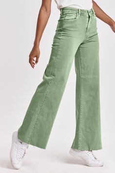 Mid rise wide leg jeans. It's cozy fit that rests lower on the waist, embraces your natural curves and accentuates your hips and thigh. Full inseam on stretch denim featuring cut-off hem details add flair to these soft pants, available in designer colors, and finished with a center inseam press for a tailored look.9 1/2" Front Rise (include waistband), 24 1/2" Leg Opening, 31" inseam (Size 27) 90% COTTON 8% POLYESTER 2% SPANDEX Machine wash cold, Tumble dry low Imported Zip fly and button closur Colorful Jeans, High Rise Wide Leg Jeans, Trendy Jeans, Cute Pants, Soft Pants, Green Jeans, Cute Preppy Outfits, School Shopping, Natural Curves