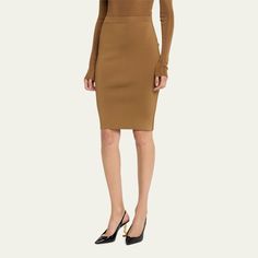 Saint Laurent pencil midi skirt  High rise; banded waist  Hem hits around the knee Pencil style Viscose/elastane Made in Italy Pencil Midi Skirt, Midi Skirt Pencil, Bergdorf Goodman, The Knee, Midi Skirt, Saint Laurent, Tops Designs, High Rise, In Italy