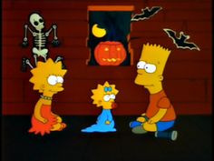 the simpsons family is dressed up in halloween costumes and pumpkins for trick - or - treat