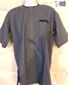 African Danshiki Men Atiku Shirt ONLY  (Gray color) - Short Sleeve- Ethnic style, Senator wear, Danshiki, African men's wear . Atiku fabric - US Size 38 to 40 - Medium  Custom Made Orders available: Allow 4 - 5 weeks  Measurements: Shirt/Pant. Measurements   Chest   Waist/stomach:  Sleeve length:  Shoulder to shoulder: Across the back:  Biceps :  Shirt length:  Pant length:  Waist:  Hips:  Thigh:  Trouser (Pant) thigh:  Care instructions: dry clean only Return policy  1. Item is not used 2. Item is still in its original packaging. 3. Item is odorless  4. the item is not winked up  4. 5% restocking fee. African Mens Wear, Stomach Sleeve, Senator Wears, Shirt Pant, Mens Wear, African Men, Pant Length, Men's Wear, Ethnic Style