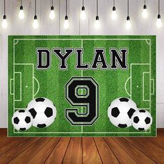 a soccer field with three balls and the number 9 on it