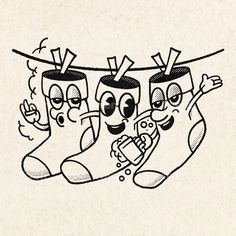 three socks hanging from a clothes line with faces drawn on them and eyes drawn in black ink