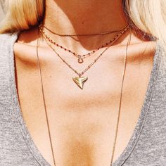 Solid bronze shark tooth, made from a tooth found on the beaches of Palm Beach on a gold filled satellite chain Gymnastics Necklace, Shark Teeth Jewelry, Tooth Jewelry, Silver Shark, Shark Necklace, Cute Ear Piercings, Shark Tooth Necklace, Teeth Jewelry, Tooth Necklace