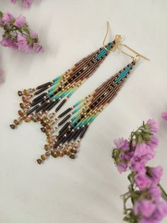 Bohemian Brown Tassel Earrings, Brown Bohemian Tassel Earrings, Bohemian Brown Fringe Earrings, Bohemian Tassel Earrings With Dangling Beads, Bohemian Tassel Earrings With Beaded Fringe, Brown Bohemian Handwoven Jewelry, Bohemian Turquoise Tassel Earrings With Beaded Fringe, Handmade Bohemian Long Drop Chandelier Earrings, Bohemian Long Drop Fringe Earrings