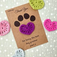 three crocheted hearts and a thank you card with the words, for being the best dog groomer ever