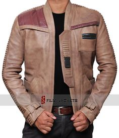 a man wearing a star wars leather jacket with his hands in his pockets and looking at the camera