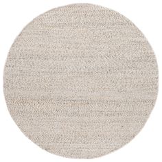 a round rug with white and beige colors on the bottom, in an oval shape