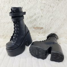 Black Spiked Platform Boots For Concert, Alternative Black Platform Boots For Concerts, Emo Platform Boots For Winter Cosplay, Black Alternative Style Platform Boots For Concert, Black Spiked Winter Platform Boots, Black Rocker Platform Boots For Alternative Fashion, Black Grunge Platform Boots With Spikes, Emo Platform Boots For Winter Concerts, Rocker Style Black Platform Boots