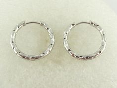 The stainless steel silver hoop earrings have an outside diameter of approx. 21mm. They are approx. 2.4 mm thick. They have a hook closure. Open the hook and let it snap back into place. The earrings are delivered in a pretty jewelry box. The hoop earrings in my shop are also available in gold, as are other hoop earrings in different sizes and colors. If you have any other wishes, please contact me. **Used material** Stainless steel hoop earrings silver pair ** Size / mass / weight ** see description / very easy ** Production method ** Made for you You can find even more jewelry here: https://www.etsy.com/de/shop/GlasschmuckBirgitH Stainless steel is a very strong material on the one hand and a very light metal on the other. A typical feature of stainless steel is the surface, which appear Hoop Earrings Silver, Steel Gifts, Pretty Jewelry, Snap Back, Hammered Silver, Pretty Jewellery, Silver Hoops, Silver Hoop Earrings, Earrings Silver