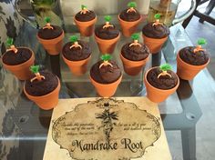 there are many cupcakes that have been made to look like carrots in the pot