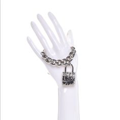 This Is An Authentic Chanel Plexiglass Pearl Cc Padlock Bracelet In Silver. This Is A Large Linked Silver Bracelet That Has A Clear Resin Padlock Shaped Pendant. Inside The Pendant Are Silver And Black Pearl Inclusions With A Facing Silver Chanel Cc Logo. This Is A Bracelet Is Sure To Start A Conversation With The Timeless Style Of Chanel! Size & Dimensions: Circumference:6.00 In / Case: 38:00 Mm/ Band: 19.00 Mm Padlock Bracelet, To Start A Conversation, Jewelry Chanel, Bracelet In Silver, Chanel Jewelry, Clear Resin, Cc Logo, Bracelet Silver, Black Pearl