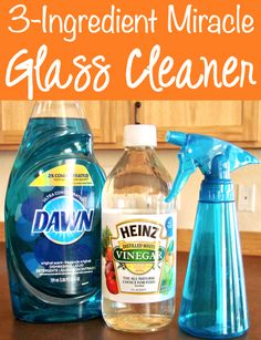 three different types of glass cleaner on top of a wooden table with text overlay