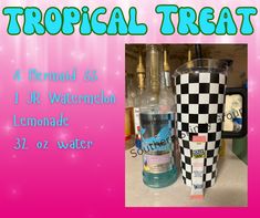 there is a bottle and a glass next to each other on the table with words tropical treat