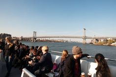 a group of people sitting on top of a boat