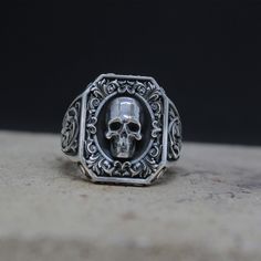 Royal Vintage Skull Rococo Signet Ring, Biker Ring, Punk Silver Ring, Gothic High Skull Ring, Oxidized Jewelry, Handmade Silver Ring For Men Elevate your style with our sophisticated silver rings for men. Crafted from high-quality materials, each piece is designed to stand the test of time while providing a touch of modern elegance to your look. Our collection includes a wide range of designs to suit any taste, from classic and simple bands to more intricate and unique styles. Whether you're dressing up for a formal occasion or looking to add a touch of polish to your everyday style, our silver rings for men are the perfect choice. Shop our collection now and find the perfect piece to express your individuality and enhance your wardrobe. ⭐ Check out our store for more unique design jewelry Biker Skull Jewelry For Gift, Biker Style Skull Jewelry Gift, Biker Style Skull Jewelry For Gift, Biker Jewelry For Halloween Gift, Biker Style Jewelry For Halloween Gift, Biker Style Halloween Jewelry Gift, Punk Skull Rings As Gift, Vintage Skull Ring For Halloween, Vintage Black Skull Ring