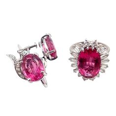 This H. Stern jewelry set, elegantly crafted from 18k white gold, exudes luxury and sophistication. The centerpiece of the set is the ring, featuring a stunning pink tourmaline, known for its captivating hue. This gemstone is beautifully accented with an array of brilliant diamonds that encircle it, enhancing its radiance. Complementing the ring are a pair of earrings, designed in harmony with the ring. These earrings also showcase pink tourmalines, each surrounded by sparkling diamonds, creatin Luxury Pink Sapphire Earrings For Formal Occasions, Elegant Pink Platinum Rings, Luxury Tourmaline Jewelry For Formal Occasions, Classic Rings For Formal Occasions With Matching Earrings, Tourmaline White Gold Jewelry With Prong Setting, White Gold Tourmaline Jewelry With Prong Setting, Elegant Tourmaline Jewelry With Accent Stones, White Gold Tourmaline Ring With Prong Setting, Elegant Ring-shaped Earrings For Formal Occasions