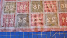 a quilted table runner with numbers on it