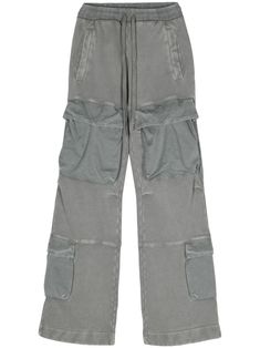 grey organic cotton jersey texture panelled design dart detailing mid-rise elasticated drawstring waistband two side welt pockets multiple cargo pockets two rear welt pockets wide leg When buying this unisex item, keep in mind that it is graded in standard men's sizing. Fendi Backpack, Entire Studios, Sweats Outfit, Tom Ford Handbags, Margiela Shoes, Youth Culture, High Quality Dress, Organic Materials, Yoga Wear