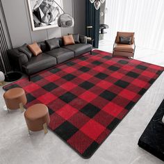 a living room filled with furniture and a red rug