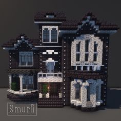 an image of a house made out of legos with windows and balconies