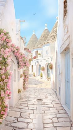 an alley way with flowers growing on the walls and cobblestone walkway between two buildings