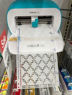 a cricutjoy machine on display in a store