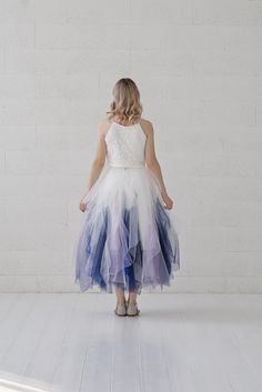 "Default features of this skirt: * It consists of one full circle tulle layer, filled with whimsical and unique tulle pieces, forming an optional watercolor style ombre at the bottom. * A line silhouette. * Non hand dyeable, but a vast color selection available and you can create your own ombre effect, or get the skirt in just all one color. You could even get it in black with a red or burgundy bottom, something that cannot ever be achieved on our hand dyed skirts. * Satin lining in half circle, Wedding Tea Length Dress With Tulle Skirt, Flowy Ruffled Tulle Dress, Flowy Tulle Dress With Ruffled Skirt, Organza Tulle Skirt For Prom, Bridesmaid Tiered Tulle Dress, Whimsical Tulle Dress, Ethereal Fitted Dress With Tulle Skirt, Tulle Prom Season Skirt, Wedding Tutu Dress With Organza Tulle Skirt