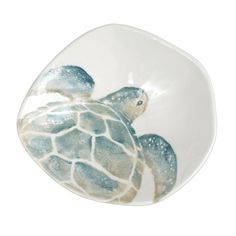 a small bowl with a turtle painted on it