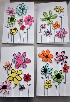 four cards with different colored flowers on them