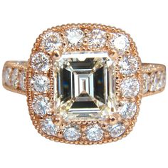 GIA 2.97ct. Emerald cut diamond & 2.40ct. diamonds ring. Emerald cut , Excellent Clean Clarity L-color, VS-1 Clarity (GIA Report attached) 2.40cts of Side round diamonds: G-color, Vs-2 clarity. 18kt. rose gold 10 grams. current ring size: 7.75 May be resized, please inquire. Deck of ring: .62 X .60 Inch Depth: .33 Inch $46,000 Appraisal Certificate to accompany along with GIA Report Ring Emerald Cut, Emerald Cut Diamond Ring, Emerald Cut Diamond, Ring Emerald, Emerald Cut Diamonds, Solitaire Ring, Emerald Cut, Diamond Rings, Or Rose