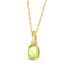 Capture her attention with the spring-green hue of this gemstone necklace. Created in 10K yellow gold An oval-cut peridot is the pendant's bright focal point A round diamond accent in white rhodium prongs tops the gem The 18-inch rope chain secures with a spring ring clasp Oval Green Necklace With Diamond Accents, Green Oval Necklace With Diamond Accents, Yellow Gold Oval May Birthstone Necklace, Oval May Birthstone Necklace, Oval Peridot Necklace For May Birthstone, Spring Green, Rope Chain, Spring Rings, Gemstone Necklace