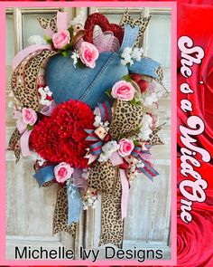 a valentine's day wreath with leopard print, pink roses and cheetah