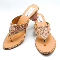 Rose Gold beaded embroidered design strap sandals offer a comfortable sole to walk on. They are beaded with Silver, light gold Rhinestones and Rosegold beads. These shoes are absolutely comfortable and offer a simple yet elegant design. These are perfect for a night out or a simple day. See our page for more of our collection of shoes we offer. We ship out in a timely matter, wrapped in care for a safe secure trip to your location. Thank you for supporting our small business. Shipped from the USA. Sizes available US 6,7,8,9,10,11. Summer Embellished Gold Heels, Summer Gold Embellished Heels, Gold Embellished Sandals With Single Toe Strap, Gold Embellished Sandals With Round Toe, Gold Embellished Round Toe Sandals, Gold Embellished High Heel Sandals, Gold Embellished Closed Toe Sandals, Gold Embellished Low Heel Sandals, Elegant Sandals For Summer Festivals