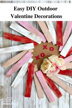 an easy diy outdoor valentine's day decoration made out of popsicle sticks