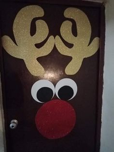 a door decorated to look like rudolph the reindeer