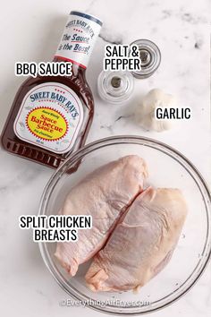 ingredients to make chicken broth on a white marble counter top with text overlay