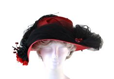 Vintage Red and Black Statement Derby Straw Hat Red straw hat is home to a red feather boa band, satin covered dome, black netting all over the brim. A large black ostrich feather, black and red roses along with bits of red berries. This hat is a true work of art. Label: Made Especially for you by La Belle Chapeau Measures Circumference: 20 1/2 inches Height: 4 inches Brim: 4 1/2 inches Condition A little dusty along the netting, estate fresh.   Vintage is anything over 20 years old, I try my be Red Feather Boa, Black And Red Roses, Red Feather, Fascinator Hats, Ostrich Feathers, Red Berries, Straw Hat, Red And Black, Vintage Denim