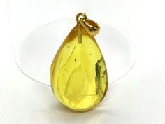 Amber Pendant With Insect Weight: 3,4 gr. (0.11 oz) Size of insect approx: 1 mm (0.03 inch) small Material: 100% Natural Baltic Amber and gold plated silver 925 Size of amber approx: 30 x 18 x 9  mm (1.18 x 0.70 x 0.35 inch) Comes from Baltic sea region Only pendant, chain not included    Is this one not for You?              Then Click here to see my other items!       Have any questions regarding the item?  Please feel free to contact us through eBay messages!      Have any problems regarding your purchase? Please contact us and we guarantee to solve it!    Have already bought the item? Thank You! Your package will be shipped in 1 day after payment receiving   Is your location far away from Lithuania? Not a problem! We ship WORLDWIDE, registered priority air mail with tracking number, ca Artisan Jewelry Necklaces, Amber Pendant, Handcrafted Artisan Jewelry, Baltic Sea, Baltic Amber, Gold Plated Silver, Lithuania, Air Mail, Artisan Jewelry