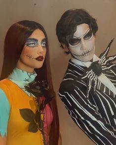 two mannequins dressed in halloween costumes, one with long hair and the other with makeup