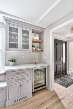 the kitchen is clean and ready to be used as a living room or dining area