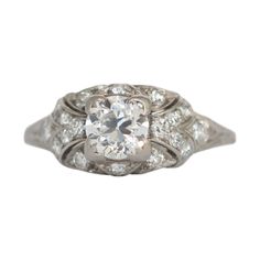 Ring Size: 7.75 Metal Type: Platinum [Hallmarked, and Tested] Weight: 3.5 grams Center Diamond Details: Weight: .68 carat Cut: Old European Brilliant Color: I Clarity: VS1 Side Diamond Details: Weight: .20 carat, total weight Cut: Antique Single Cut Color: F Clarity: VS Finger to Top of Stone Measurement: 4.5mm Condition: Excellent