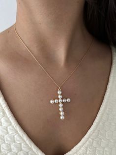 A pearl and gold plate pearl cross pendant paired on 14k gold filled chian, 18" Elegant Cross Necklace With Pearl Drop, White Cross Necklace With Pearl Charm, Pearl Necklace With Cross-shaped Pearl Pendant, Pearl Drop Cross Pendant Necklace, White Cross Pendant Necklace With Pearl Drop, White Pearl Cross Pendant Necklace, White Cross Necklace With Pearl Drop, Cross Pendant Necklace With Pearl Charm, Pearl Cross Necklace With Pearl Drop