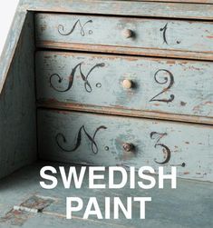 an old dresser painted in blue with the words swedish paint overlayed on it